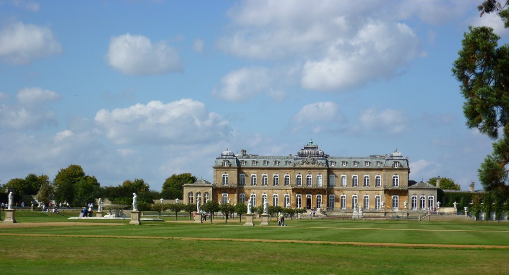 French style stately home with lawns,statues and fountains.